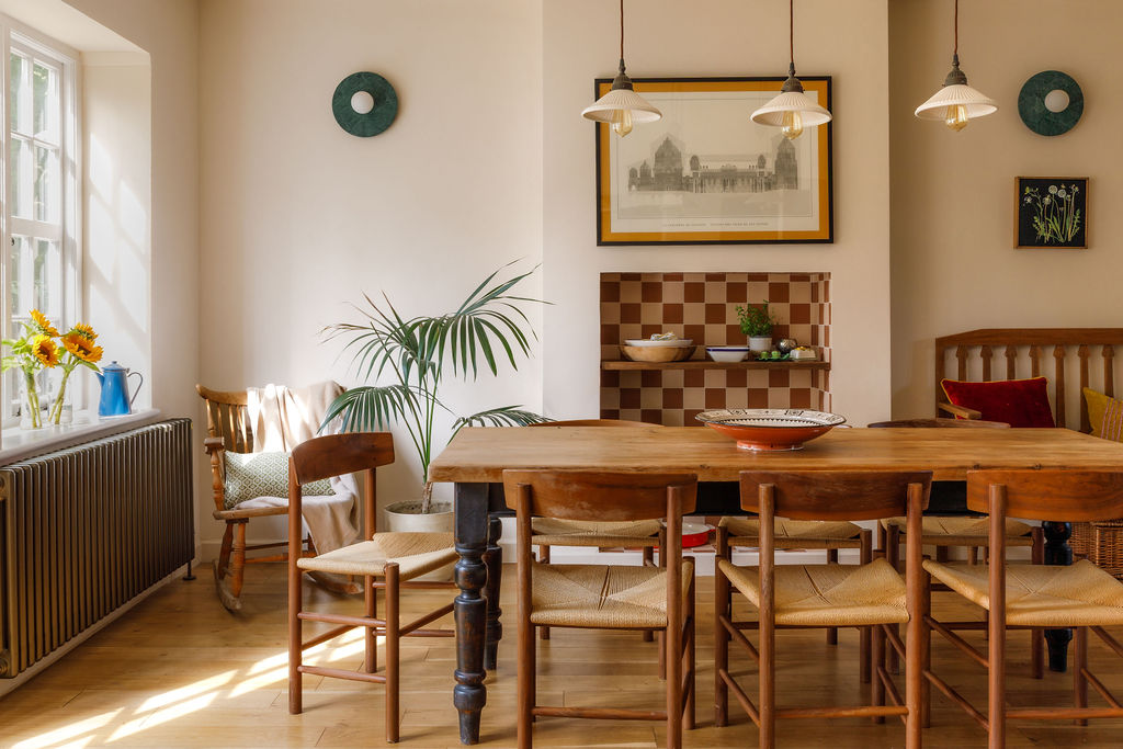 A warm, light-filled dining room designed by Lisa Sharabani